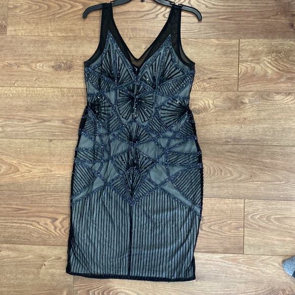 Size 10 lined beaded just above the knee cocktail dress. - Picture 4 of 7